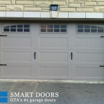 massive carriage style barn overhead garage doors installed in Woodbridge