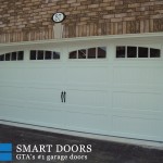 White carriage style garage doors installed in North York, Toronto