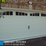 barn style overhead panel carriage door installed by smart door