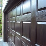 Fiberglass garage door with raised overhead panels installed at Toronto home