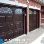 double fiberglass garage door with raised overhead panels and glass insert installed at Richmond hill