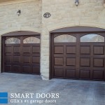 Double Raised Panel Fiberglass garage doors with glass inserts installed in Vaughan Home