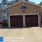 Wooden accent double overhead garage doors installation by smart doors