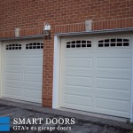 Garage Door replacement project Markham featuring Raised Long Panel white Garage Doors Installed and Replaced