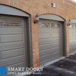 Thornhill garage door replacement project showcasing raised panel garage door with glass inserts installed by smart doors