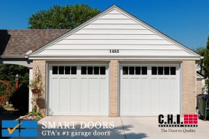 Carriage-style Insulated Steel garage doors with window in White color and windows
