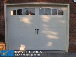 Insulated fiberglass overlay carriage style garage doors by Smart Doors