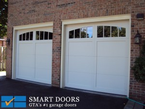 Carriage style fiberglass overlay garage doors in white Installed in Markham