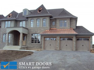 Markham new install feature carriage-style Insulated steel garage doors
