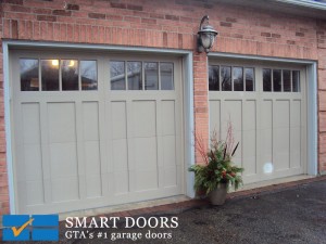 Steel short recessed panel carriage style garage doors by Smart Doors
