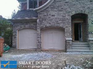 new construction barn style garage doors installed
