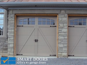 Toronto Home gets new barn style cedar overlay steel frame garage doors