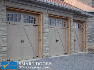 Toronto project feature barn style triple garage door installed