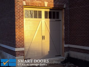 barn style triple garage door installed by Smart Doors