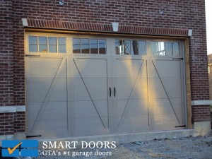 Carriage style wood overlay on steel frame garage door fitted in Vaughan