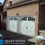 double overhead doors in White Carriage style overlay - garage door replacement Thornhill
