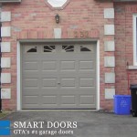 Garage Door replacement Toronto featuring raised panel doors in matt grey