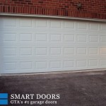 white raised panel Garage door installed in Toronto by smart doors
