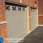 raised panel overhead garage door with window insert installed in Markham home