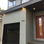 Modern Flush Black Overhead Garage door by smart doors