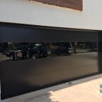 flush black overhead panel Glass Garage Door Installation in Oakville