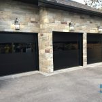 set of 3 Matt black overhead garage doors installed in Thornhill