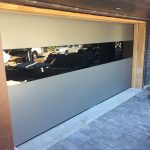 Overhead garage doors replacement project featuring Matt grey flush panel doors installed in North York