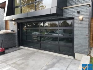 Black overhead glass garage doors Installation In Toronto