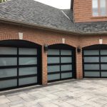 Pair of three Glass Garage Doors Installed