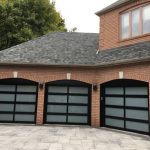 Check out these elegant glass garage doors installed by Smart Doors in Thornhill, Toronto