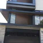 Smooth Black Garage Doors with Glass-Toronto Installation #117