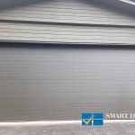 overhead garage doors replacement featuring flush panel doors
