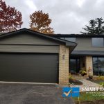 Overhead Garage Doors replacement in Toronto featuring black flush panel doors