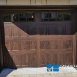 Overhead Garage Doors installation in Toronto featuring classic recessed panel style doors
