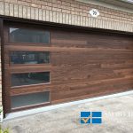 overhead Garage Doors replacement in Toronto featuring flush panel door in cedarwood finish