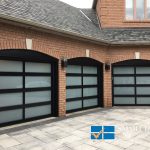 Overhead Garage Doors replacement in Toronto featuring triple glass panel doors with aluminum frame