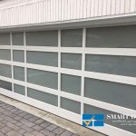 Overhead Garage Doors Installations Toronto featuring white frame all glass panel door