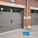 Overhead Garage Doors Installations in Toronto featuring pair of all gray carriage style doors