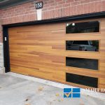 Custom Garage Doors Installations in Toronto featuring cedar wood overlay door with windows