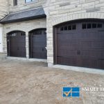 Overhead Garage Doors Installations in Toronto featuring Pair of two wooden overlay doors