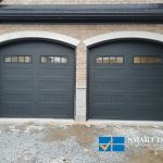 Overhead Garage Doors Installations in Toronto featuring double raised panel door with windows