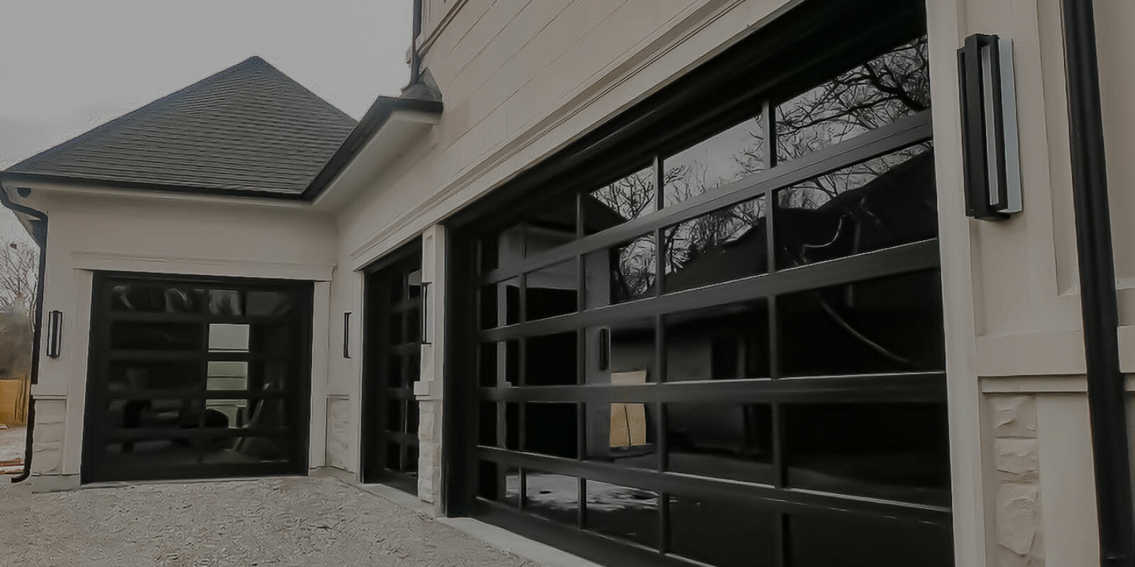 three full-view aluminum glass garage door installed